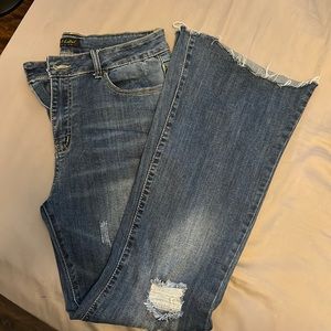 Not sure of the brand. Womens distressed flare jeans size 9.